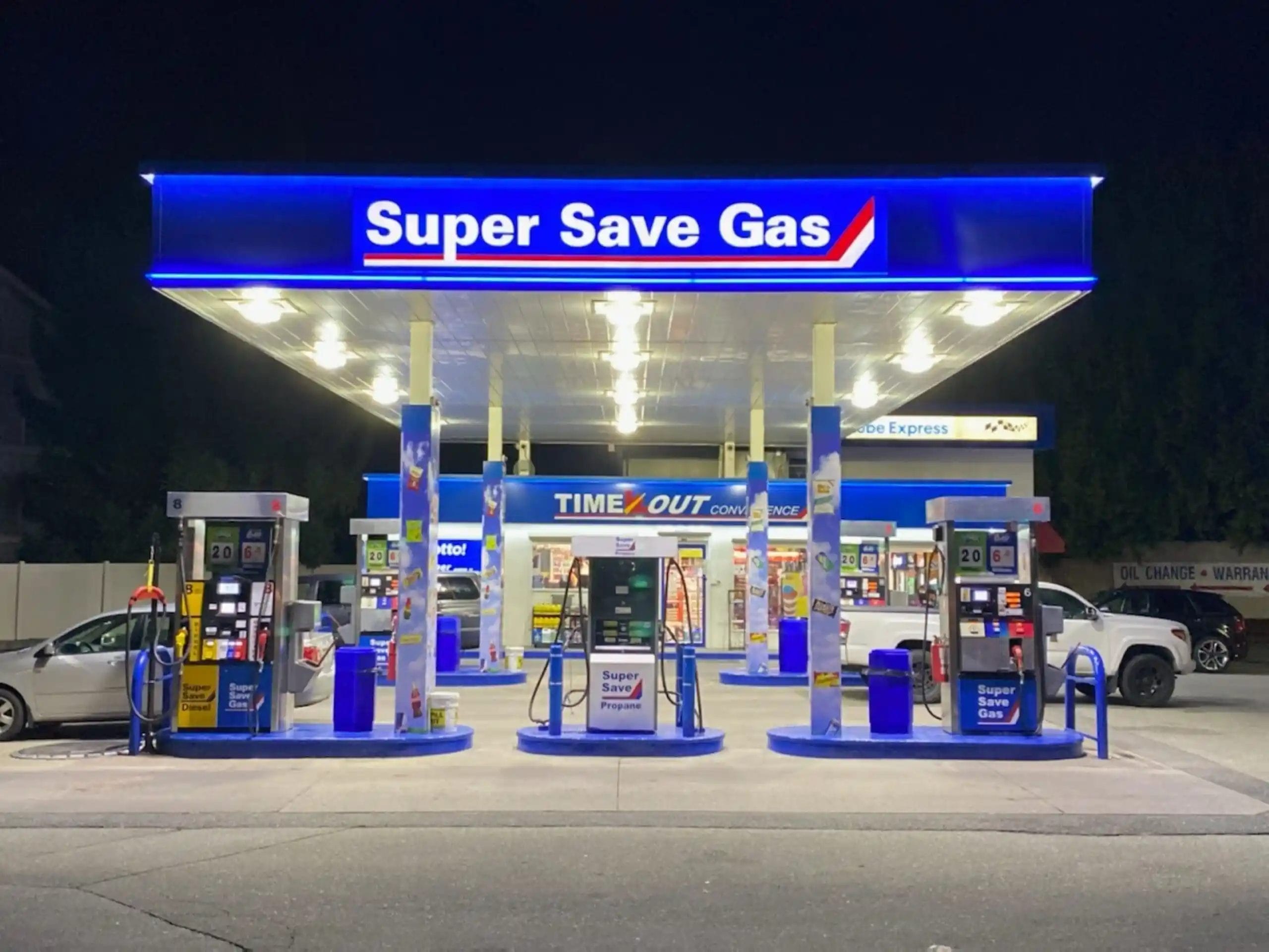 Super save gas station at night with lights